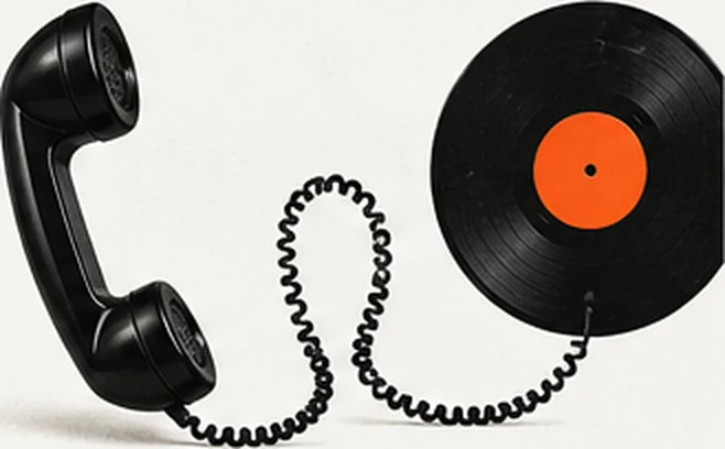 A telephone handset whose coiled cord runs into a vinyl record.
